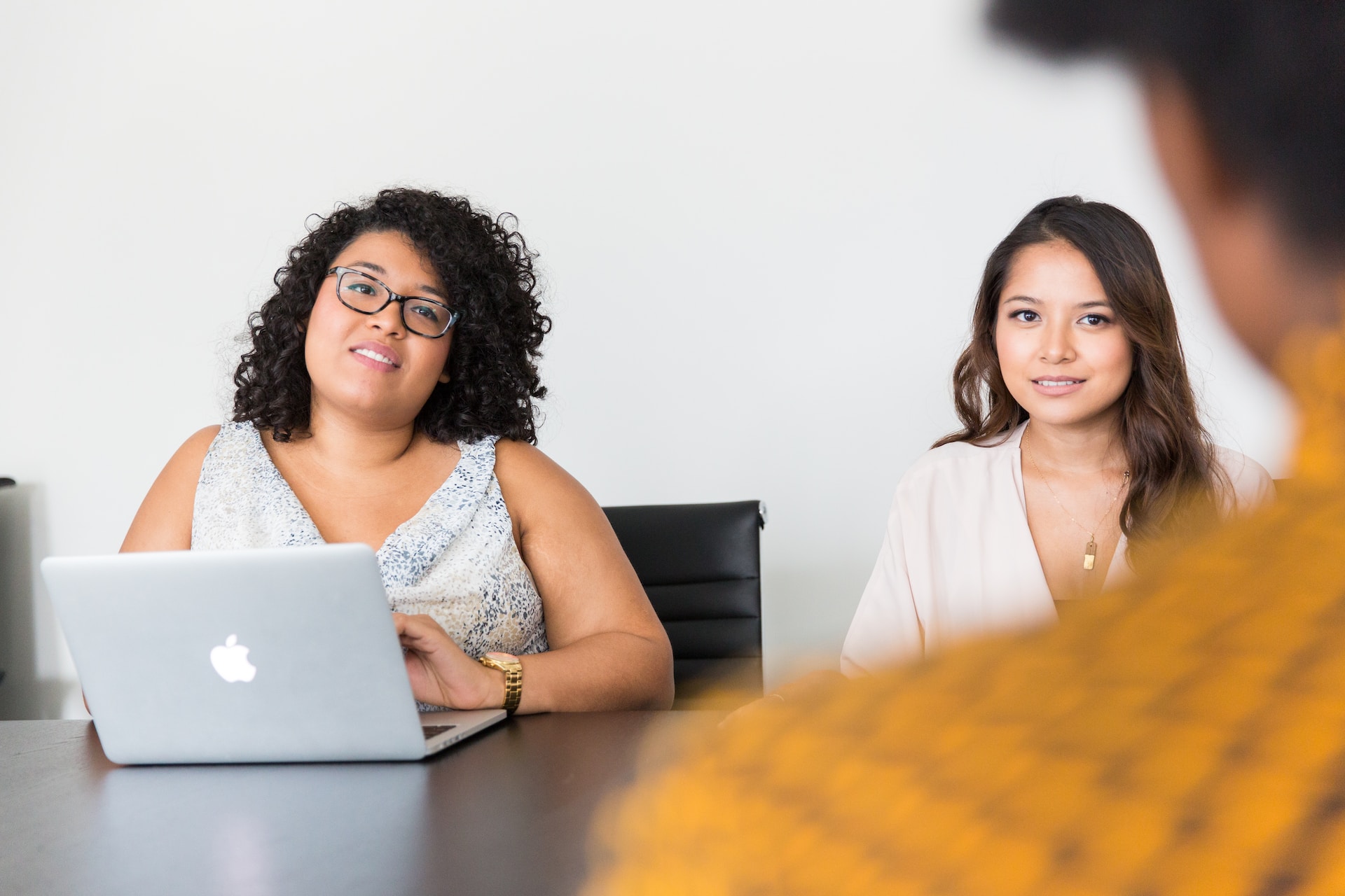 Two women interviewing an applicant in the office. Photo by Christina @ wocintechchat.com on Unsplash