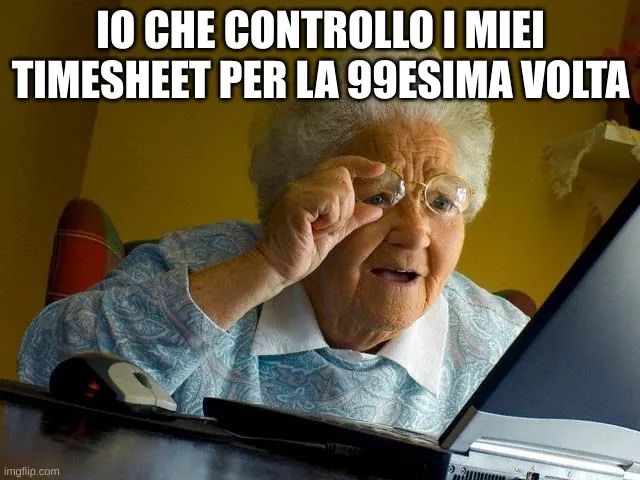 La nonna controlla i suoi timesheet con gli occhiali.